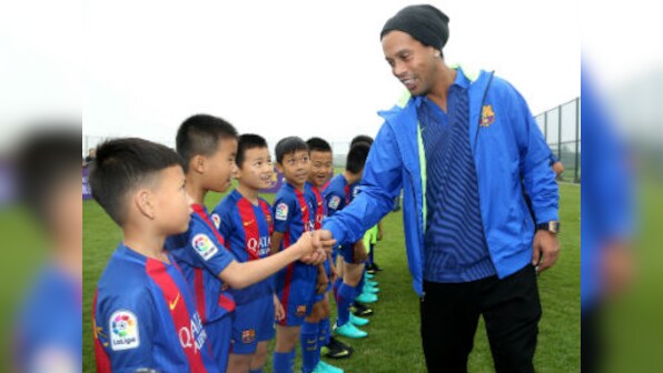 Ronaldinho launches Barcelona academy in China, believes it will benefit football in the country