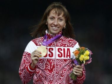 File photo of Russia's Mariya Savinova holding her gold medal for women's 800m at the London Olympics. Reuters