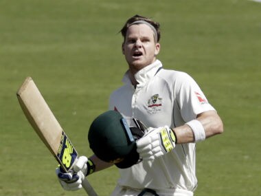 Australia's Steve Smith celebrates after scoring a century on Day 3 of the first Test against India. AP