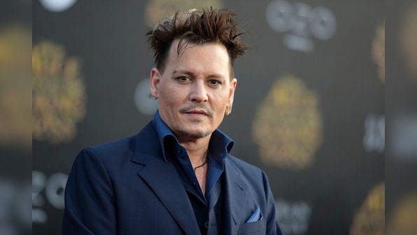 Johnny Depp settles lawsuits with former business managers who had questioned his lavish lifestyle