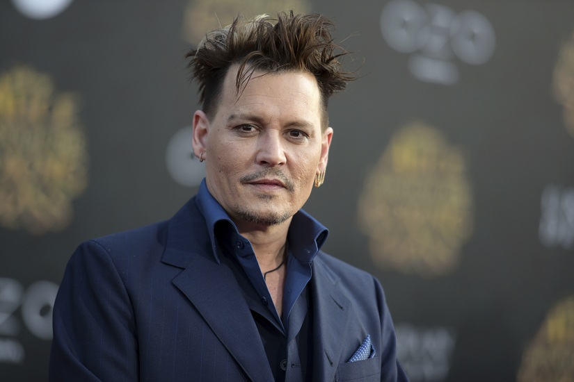 Johnny Depp sued by location manager for allegedly punching him on sets of City of Lies in Los Angeles Johnny Depp sued by location manager for allegedly punching him on sets of City of Lies in Los Angeles
