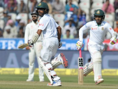 Bangladesh captain Mushfiqur Rahim (R) and Mehedi Hasan in action during the Hyderabad Test against India. AFP