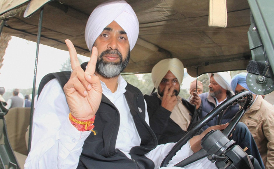 Congress candidate from Bathinda (urban) Manpreet Singh Badal showing a victory sign after casting his vote in Badal village in Muktsar district on Saturday. In this Congress versus AAP versus the SAD-BJP fight, Punjab is all set to see some interesting results on 11 March. PTI. Congress candidate from Bathinda (urban) Manpreet Singh Badal showing a victory sign after casting his vote in Badal village in Muktsar district on Saturday. In this Congress versus AAP versus the SAD-BJP fight, Punjab is all set to see some interesting results on 11 March. PTI.