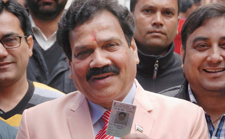 Congress candidate Raj Kumar Verka showing his voter identity card at a polling station before casting vote for Assembly elections in Amritsar on Saturday. Punjab recorded an estimated 70 percent polling for the high-stake contest among Congress, new entrant AAP and ruling SAD-BJP combine. PTI Congress candidate Raj Kumar Verka showing his voter identity card at a polling station before casting vote for Assembly elections in Amritsar on Saturday. Punjab recorded an estimated 70 percent polling for the high-stake contest among Congress, new entrant AAP and ruling SAD-BJP combine. PTI
