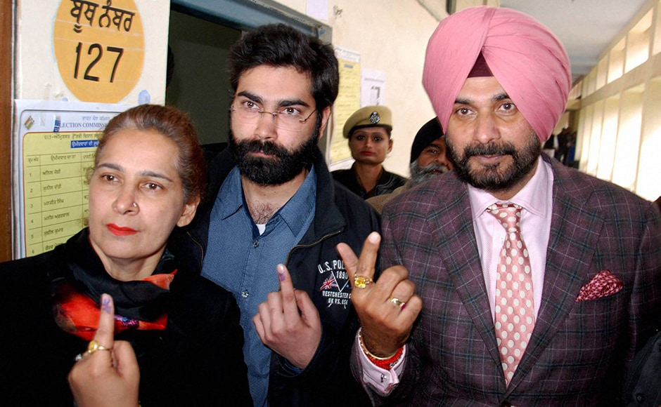 First phase of polling in Punjab was conducted on Saturday, 4 February. Congress candidate Navjot Singh Sidhu, along with his wife Navjot Kaur and his son, after casting their votes at a polling station in Amritsar on Saturday. The Amritsar Lok Sabha seat fell vacant following the resignation of Amarinder Singh to protest the apex court verdict on Punjab's river waters. PTI First phase of polling in Punjab was conducted on Saturday, 4 February. Congress candidate Navjot Singh Sidhu, along with his wife Navjot Kaur and his son, after casting their votes at a polling station in Amritsar on Saturday. The Amritsar Lok Sabha seat fell vacant following the resignation of Amarinder Singh to protest the apex court verdict on Punjab's river waters. PTI