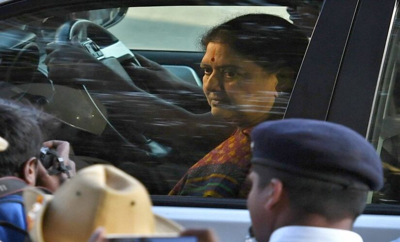 VK Sasikala arrives to surrender at the special court in Bengaluru on Wednesday. PTI