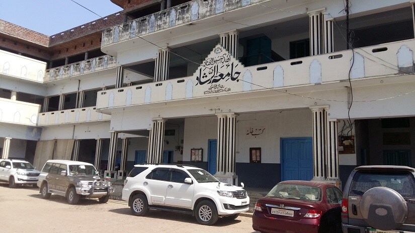 Interior of the Jameatur Rashad madrassa. An unusually high number of SUVs and cars can be seen because fo the political influence of the clergy. Firstpost/Tufail Ahmad