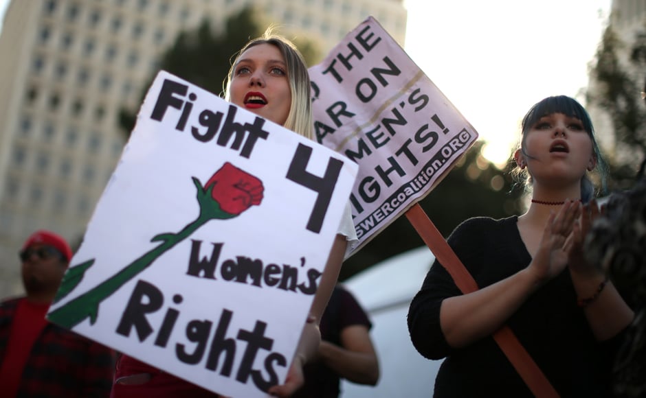 People participate in the International Women's Day "A Day Without a Woman" anti-Trump protest in Los Angeles, California, U.S., March 8, 2017. REUTERS/Lucy Nicholson