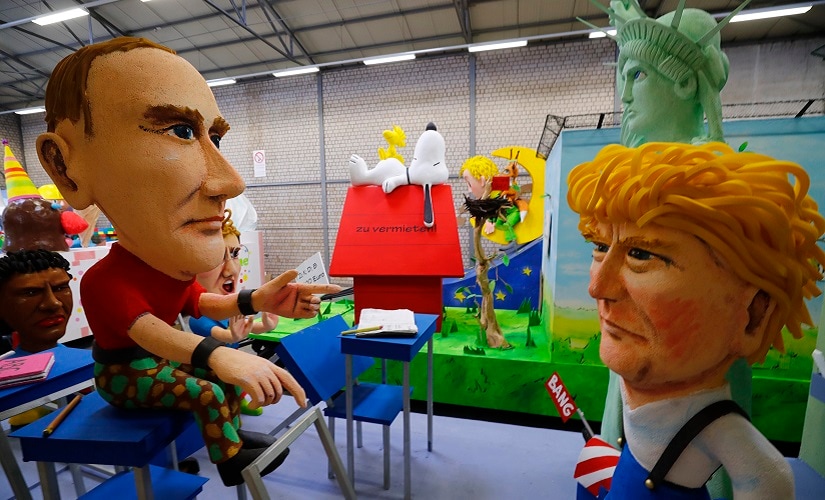 Papier mache caricatures depicting US President Donald Trump and Russian President Vladimir Putin. Reuters