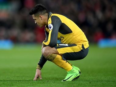 Arsenal's Alexis Sanchez looks dejected during the Premier League match against Liverpool. Getty Images