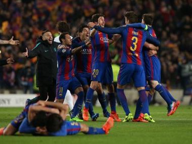 Barcelona players celebrate after the game. Reuters