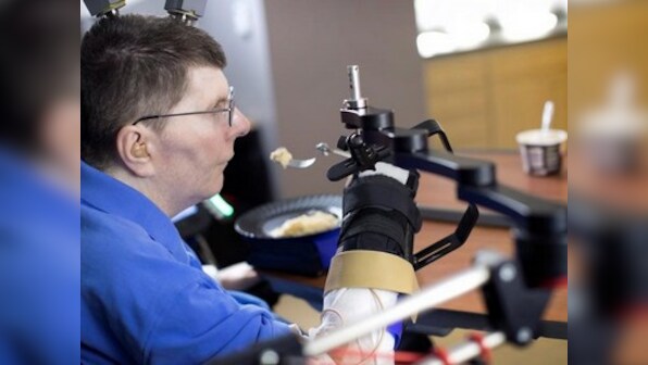 Thought-controlled robotic arms may be a reality soon: Brain implant lets paralysed man feed himself