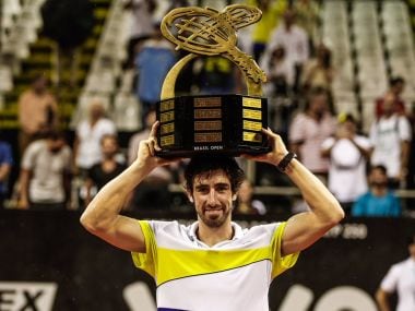 Pablo Cuevas with the Brazil Open trophy. Image courtesy: Twitter/@BrasilOpenTenis