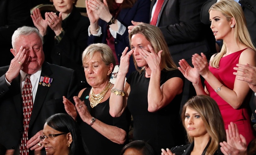 Carryn Owens, widow of widow of Chief Special Warfare Operator William “Ryan” Owens, wipes her eyes on Capitol Hill in Washington on Tuesday. AP