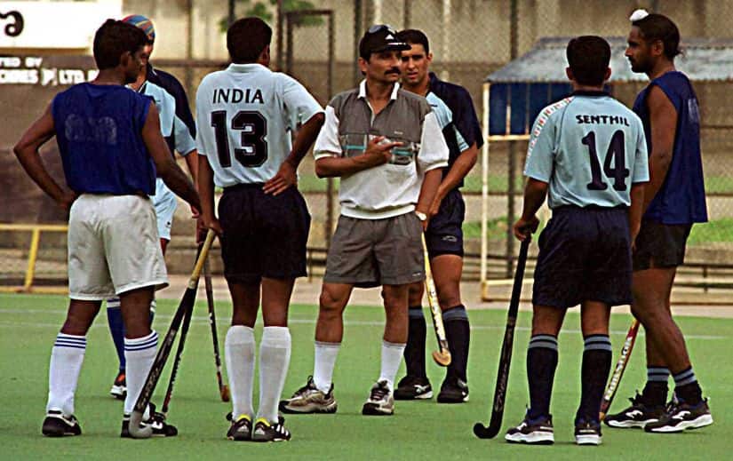 File photo of Indian hockey coach Cedric D&rsquo; Souza with his players at the national hockey camp in Bangalore April 26, 2001. AFP