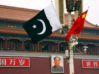 A Pakistan national flag flies alongside a Chinese national flag in front of the portrait of Chairman Mao Zedong on Beijing's Tiananmen Square during Pakistan' Prime Minister Yusuf Raza Gilani's visit May 18, 2011. PM Yusuf Raza Gilani's visit to China from Tuesday allows Islamabad to show it has another major power to turn to just as relations with the United States have faced intense strain after the killing of Osama bin Laden. The visit is part of long-planned celebrations for 60 years of diplomatic ties but the vows of support from Beijing will be especially timely for Islamabad. Reuters