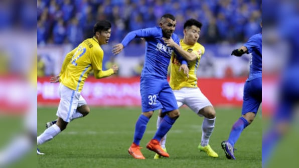 Chinese Super League: Carlos Tevez scores and sets up two on debut as Shanghai Shenhua beat Jiangsu Suning