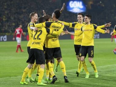 Dortmund's Pierre-Emerick Aubameyang, center, celebrates after scoring against PSG. AP