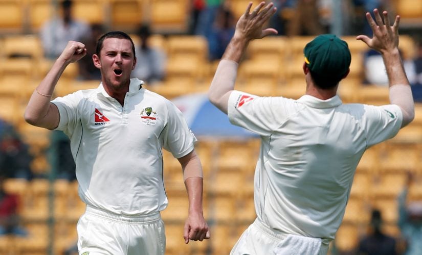 Australia's Josh Hazlewood celebrates the wicket of Ravindra Jadeja. REUTERS/Danish Siddiqui - RTS11LD6