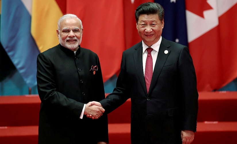 Chinese President Xi Jinping shakes hands with Indian Prime Minister Narendra Modi during the G20 Summit in Hangzhou, Zhejiang province, China September 4, 2016. REUTERS/Damir Sagolj/File Photo - RTSS6MX