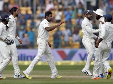 Indian players celebrate their win over Australia in the second Test. AP