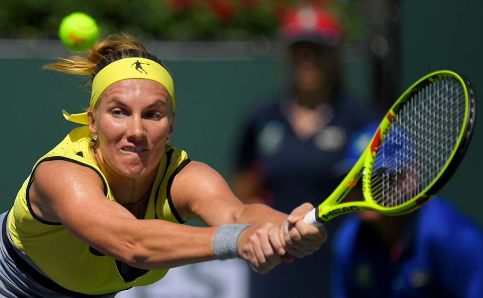 Svetlana Kuznetsova, of Russia, hits to Elena Vesnina, also of Russia, during a final match at the BNP Paribas Open tennis tournament, Sunday, March 19, 2017, in Indian Wells, Calif. (AP Photo/Mark J. Terrill)