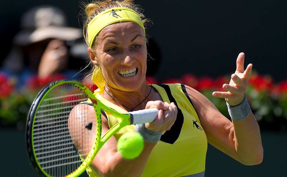 Svetlana Kuznetsova, of Russia, hits to Elena Vesnina, also of Russia, during a final match at the BNP Paribas Open tennis tournament, Sunday, March 19, 2017, in Indian Wells, Calif. (AP Photo/Mark J. Terrill)