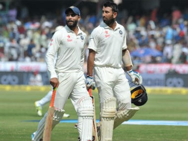 Ravindra Jadeja (left) and Cheteshwar Pujara.
