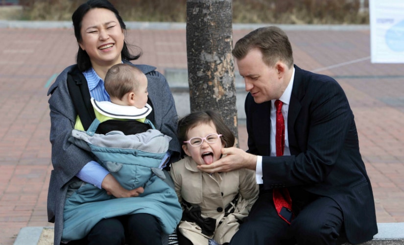 Robert Kelly with his wife and kids. AP