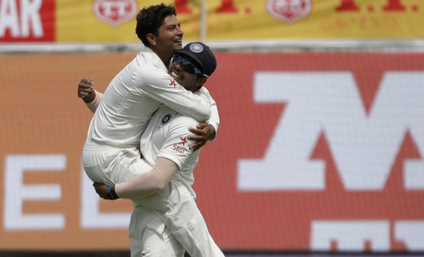 Kuldeep Yadav celebrates a wicket at Dharamsala.