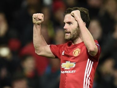 Manchester United's Juan Mata celebrates after scoring against Rostov. AFP
