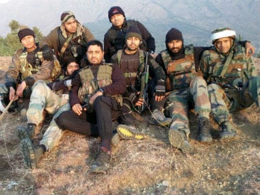 Major Rishi with members of his unit 42 Rashtriya Rifles.