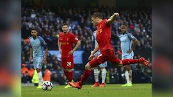 Premier League roundup: Manchester City held by Liverpool, Tottenham close gap on Chelsea