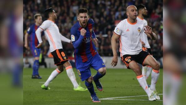 La Liga: Barcelona's Lionel Messi scores brace to close gap on Real Madrid, Atletico trounce Sevilla