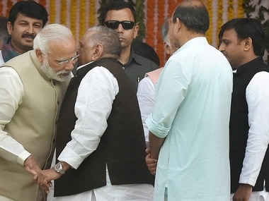 Narendra Modi and Mulayam Singh Yadav. PTI