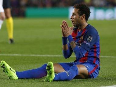 Barcelona's forward Neymar appeals for a foul against PSG. AFP