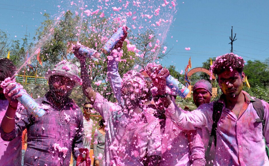 Youths celebrating Holi festival in Lucknow on Monday. PTI Youths celebrating Holi festival in Lucknow on Monday. PTI