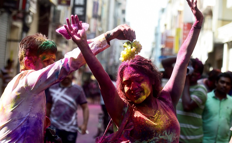 People enjoying with colours during Holi celebrations at Sowcarpet area in Chennai on Monday. PTI People enjoying with colours during Holi celebrations at Sowcarpet area in Chennai on Monday. PTI