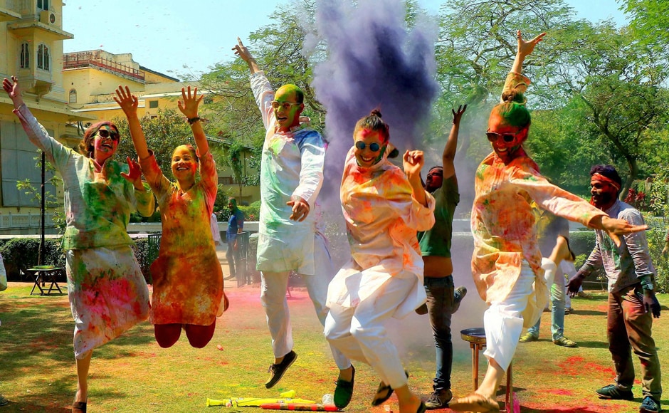 Locals and foreigners celebrating Holi festival at Khasa Kothi in Jaipur on Monday. PTI Locals and foreigners celebrating Holi festival at Khasa Kothi in Jaipur on Monday. PTI