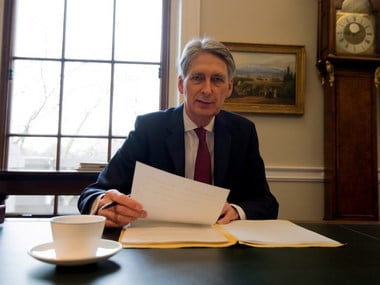UK's Chancellor of the Exchequer, Philip Hammond, prepares his speech ahead of his 2017 budget annoucement. Getty Images