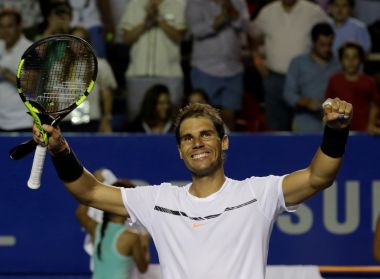 Rafael Nadal celebrates his victory oer Marin Cilic. REUTERS
