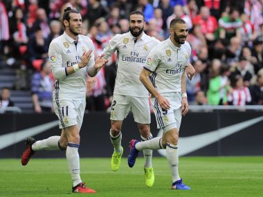 Real Madrid's Karim Benzema (right) celebrates his goal with teammates. AFP