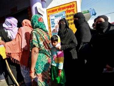 Women queue up to vote during the state Assembly election in the Uttar Pradesh. Reuters