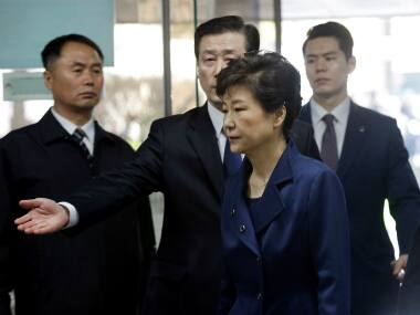 Ousted South Korean President Park Geun-hye arrives for questioning on her arrest warrant at the Seoul Central District Court in Seoul, South Korea, Thursday,