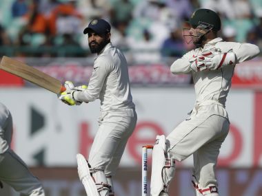 Ravindra Jadeja (L) plays a shot during the Dharamsala Test as Matthew Wade watches on. AP