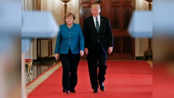Donald Trump sidesteps blame over wiretap row with Britain, revives another in meeting with Angela Merkel