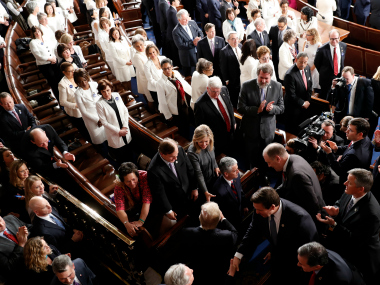 Donald Trump's US Congress address: Democrat women wear white and ACLU ribbons to make statement Donald Trump's US Congress address: Democrat women wear white and ACLU ribbons to make statement