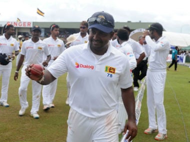 Rangana Herath leaves the grounds after victory in the first Test between Sri Lanka and Bangladesh in Galle. AFP
