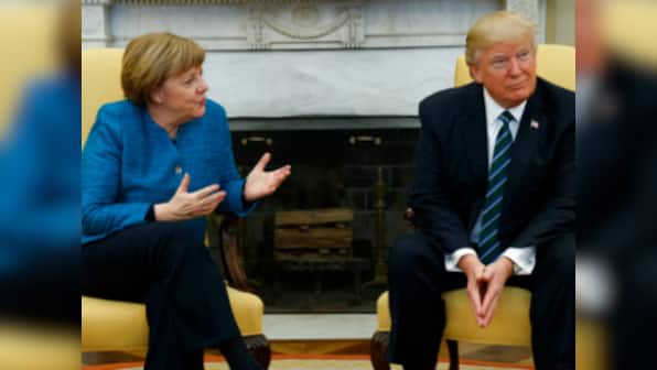 Donald Trump and Angela Merkel: Stark differences in full view during icy first meeting