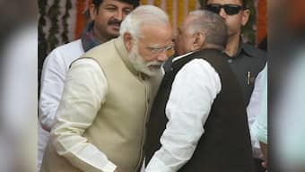 As Yogi took oath to be UP CM, Mulayam whispered something to Modi: Here's what he definitely did not say